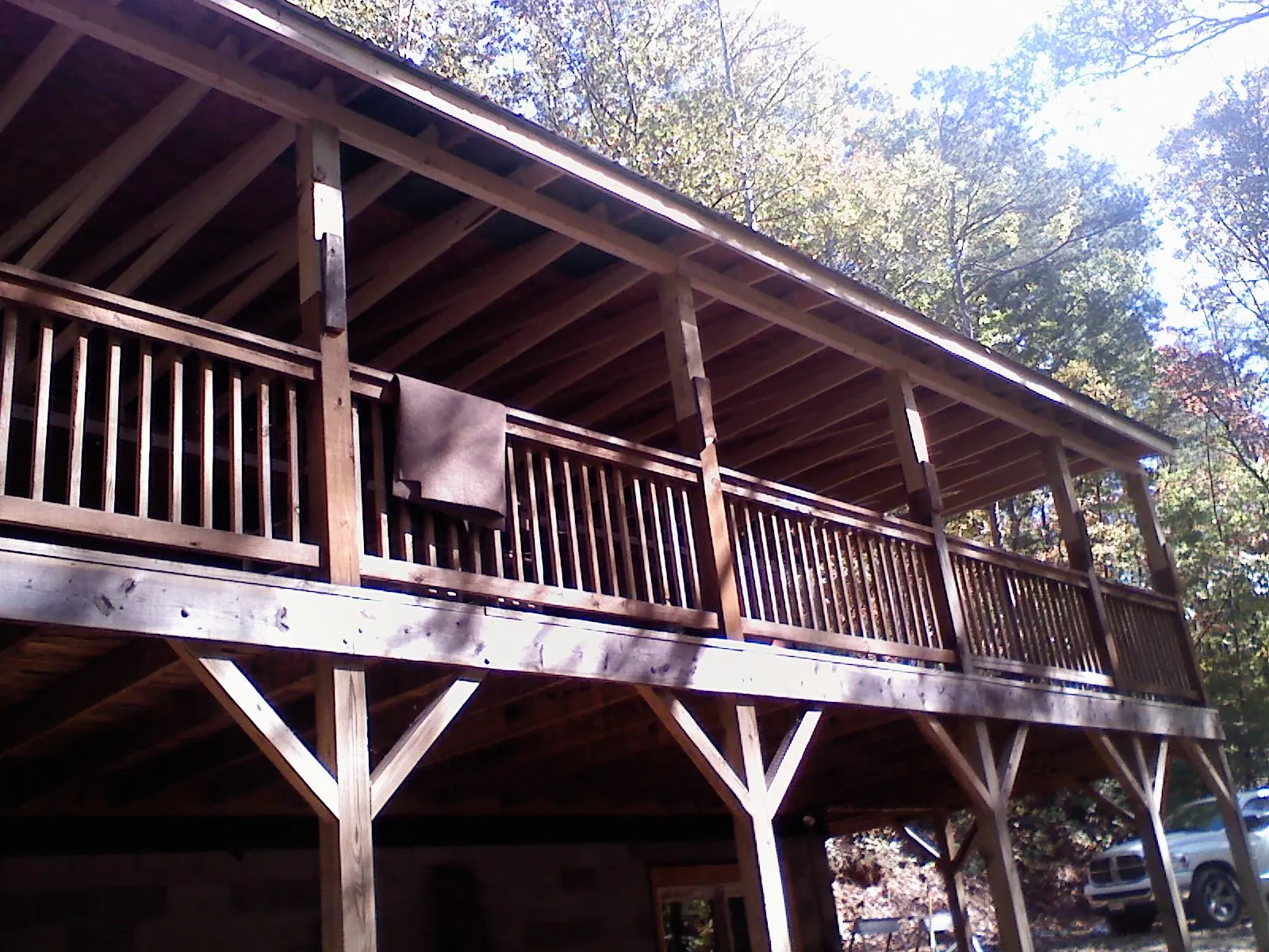 Timber framing under a new elevated porch and deck — Roof Leak Repair in Woods Hole by Roofing Brothers